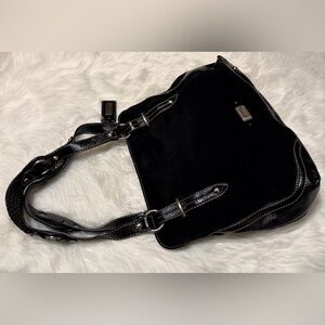 The Sak Elegant Black Shoulder Bag with Polished Accents